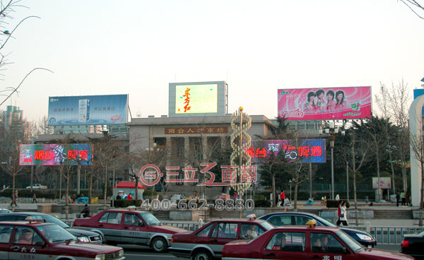 山東省煙臺(tái)市芝罘區(qū)人才市場(chǎng)樓頂三面翻廣告牌案例圖片